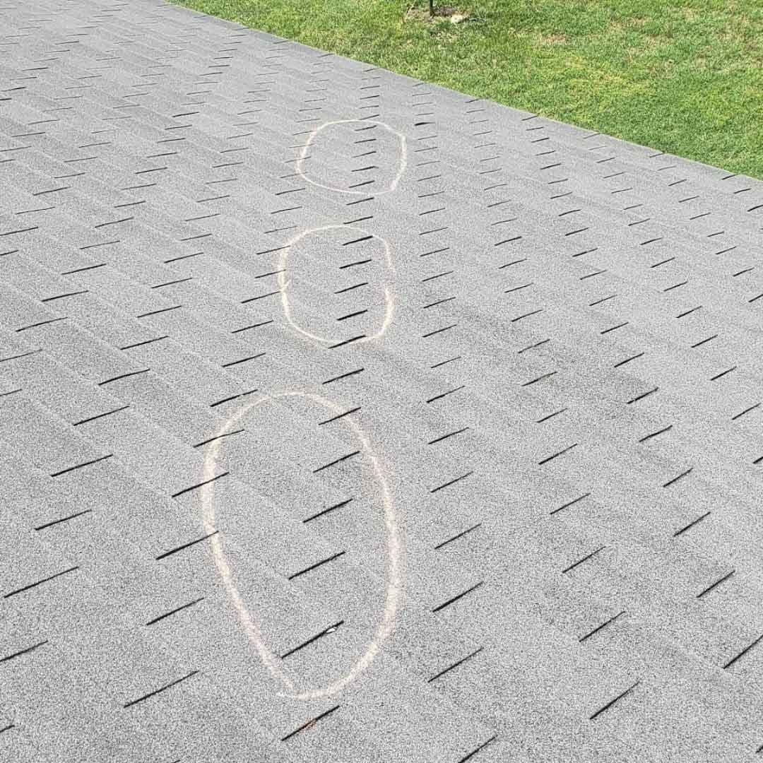 Roof inspection in progress by Amos Roofing in Waco, TX